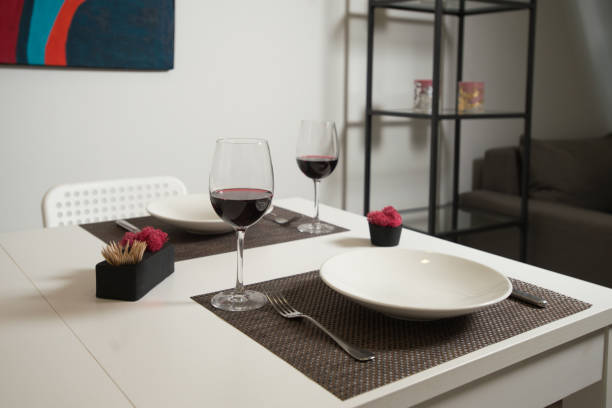 istock Glassware and cutlery for catered event dinner. 1213719563