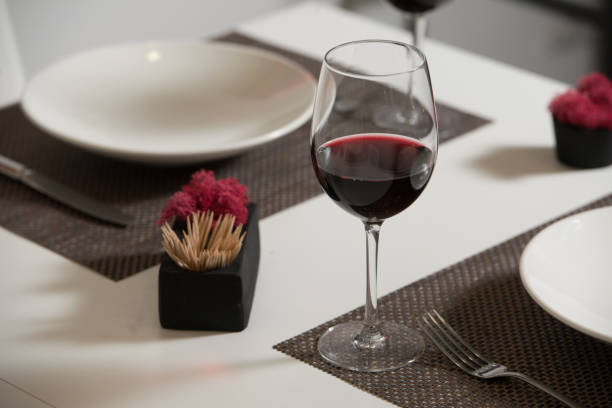 istock Glassware and cutlery for catered event dinner. 1213719646