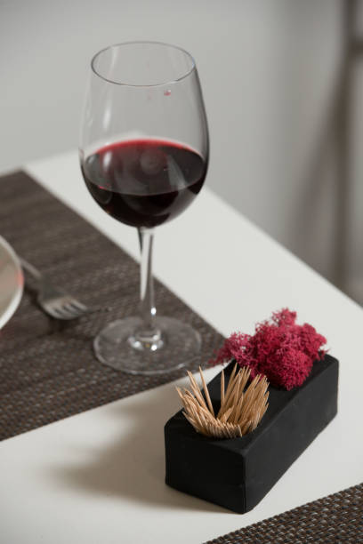 istock Glassware and cutlery for catered event dinner. 1213719719