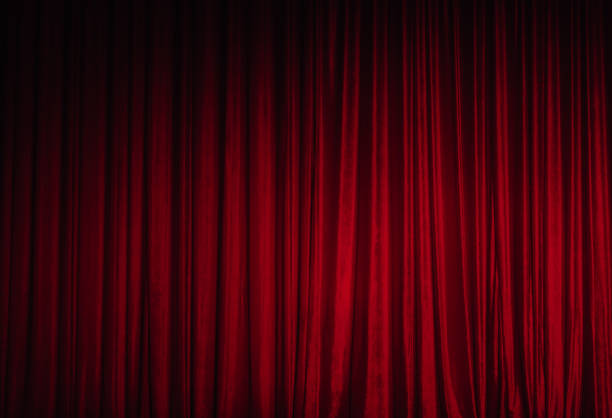 Red Theatre Stage Curtain Background Background of red spotted real theatrical velvet curtain or drapes texture opera stock pictures, royalty-free photos & images