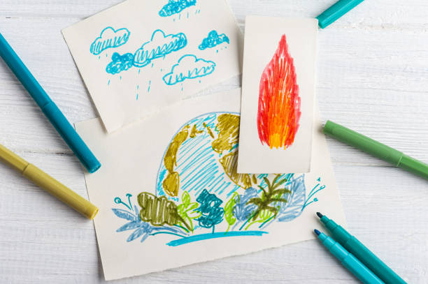istock hand drawing of Earth on white table 1213722518