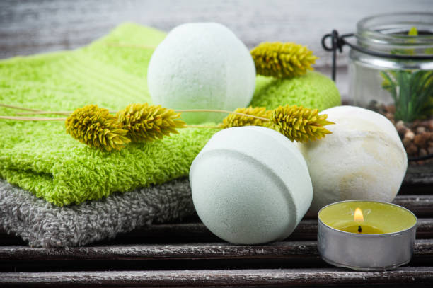 istock Aroma bath bombs, green towels 1213722693