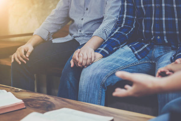 istock Christian group are praying together 1213722836
