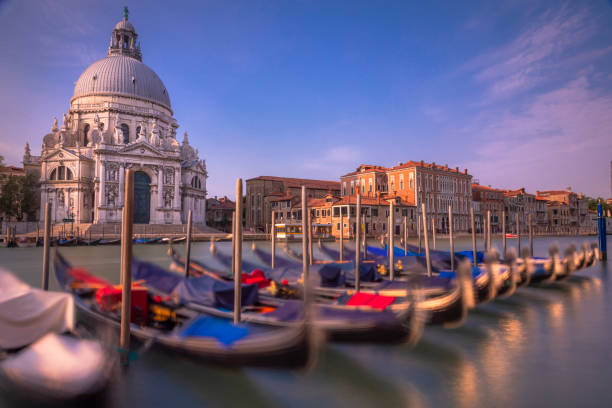 Ethereal long exposure - View of Grand Canal at sunrise, Venice, Italy Ethereal long exposure - View of Grand Canal at sunrise, Venice, Italy venice italy grand canal honeymoon gondola stock pictures, royalty-free photos & images