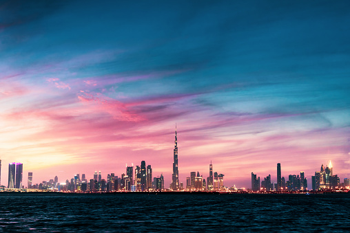 Beautiful sunset over Dubai panorama landmark view from the Dubai creek harbor
