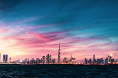 Beautiful sunset over Dubai landmark view from the Dubai creek harbor