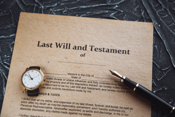 istock Notary's public pen and stamp on testament and last will. Notary public 1213727115