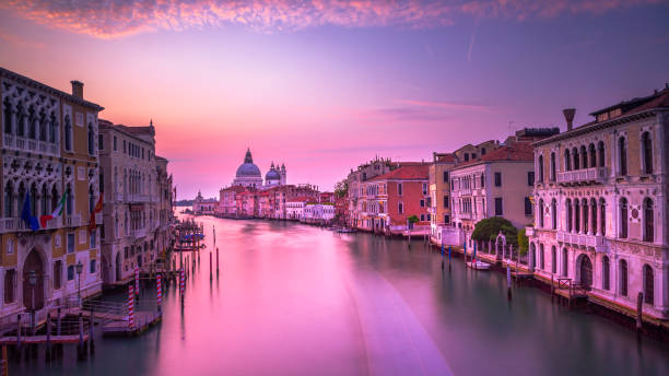 Ethereal long exposure - View of Grand Canal at sunrise, Venice, Italy Ethereal long exposure - View of Grand Canal at sunrise, Venice, Italy venice italy grand canal honeymoon gondola stock pictures, royalty-free photos & images