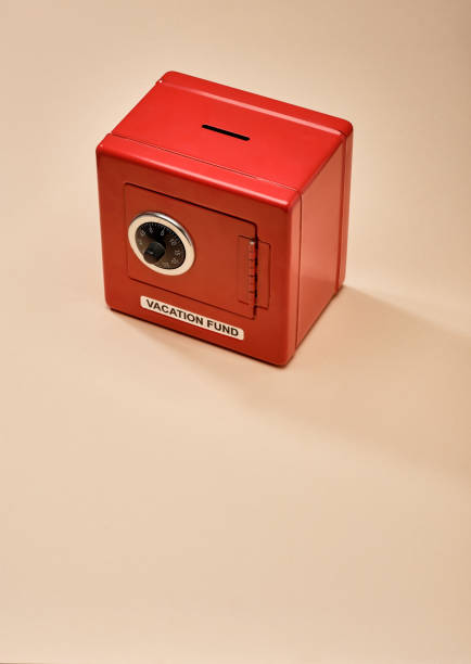 istock Red safe on pink paper background 1213728183