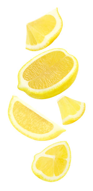 istock Lemon slices cut fall, soar, flying isolated on white background with clipping path. Full depth of field. Set of part. 1213728765