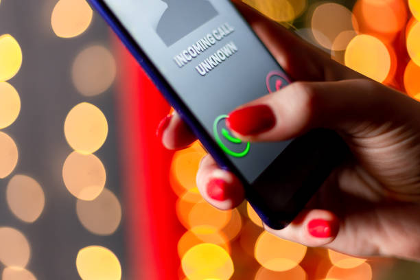 istock Scam unknown caller. Scary number on the display. 1213728908