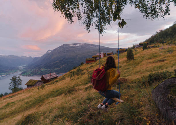 istock Woman on swing in Norway 1213729882