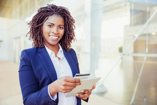 istock Happy cheerful customer paying online 1213730256