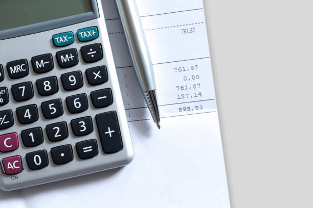 istock calculating tax and payment 1213732328