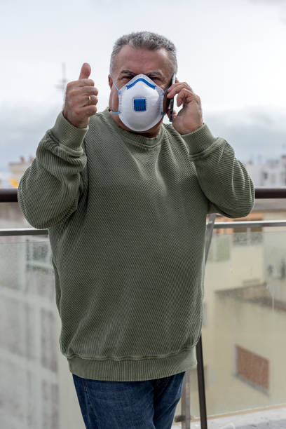 istock Adult man with protective mask for coronavirus 1213734899