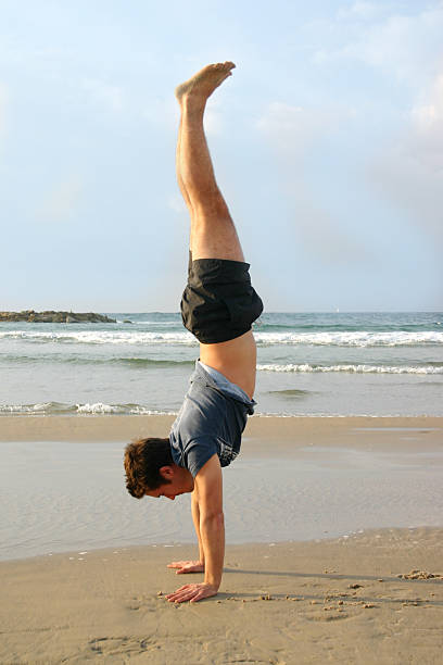 1,400+ Beach Handstand Stock Photos, Pictures & Royalty-Free Images ...