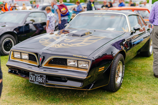 Bray, Ireland, June 2018 Bray Vintage Car Club show with open air retro cars display. Front view on black Pontiac Firebird from 1979