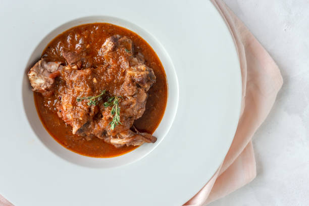 istock Lamb stew with aromatic herbs seen from above 1213736873