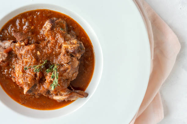 istock Lamb stew with aromatic herbs seen from above 1213737545