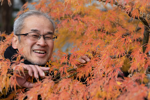 Senior man enjoying autumn