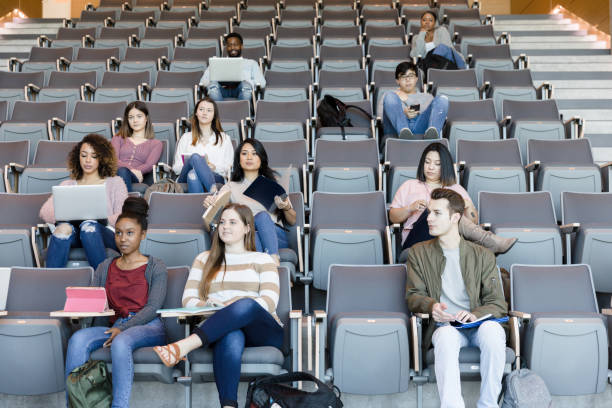 istock Partially filled lecture hall on college campus 1213739031