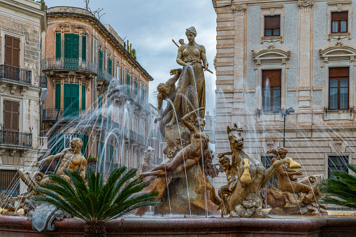 Beautiful square and fountain of Diana at the center of square Archimede in province of Syracuse in Sicily, south Italy