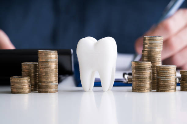 istock White Tooth In Front Of Man Calculating Bill 1213742227