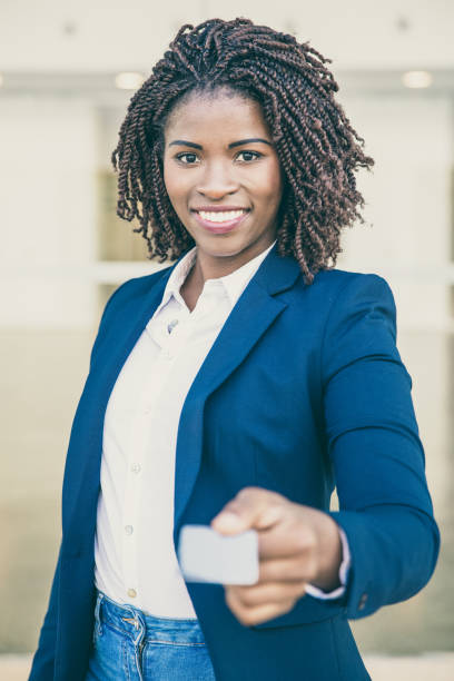 istock Happy successful consultant giving name card 1213742337