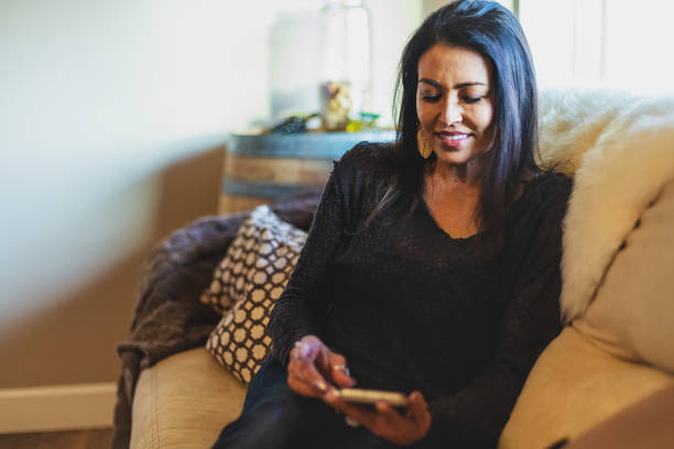 istock Mature Hispanic Female Relaxing at Home Expression Portrait Series 1213743919