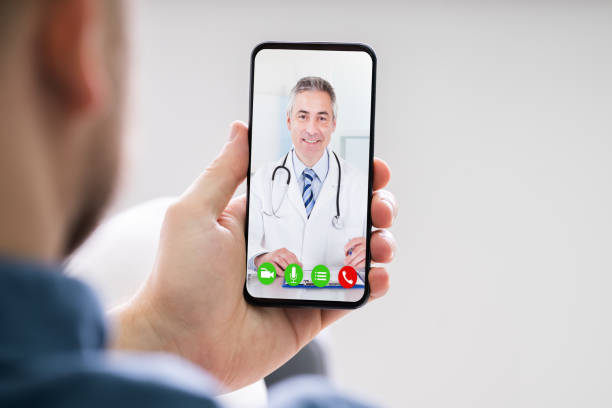 istock Person Videochatting With Doctor 1213744484