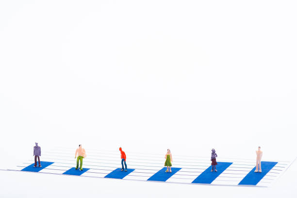istock Concept of equality with people figures on surface of blue graphs isolated on white 1213745963