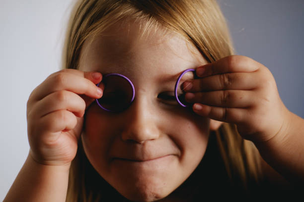 istock Young girl fooling around making faces 1213746688