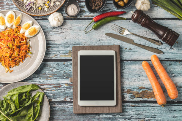 istock Digital tablet and vegan food 1213747762