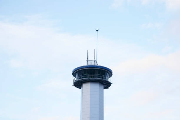 istock Communication tower high in blue sky with aerial for mobile technology network 1213747961