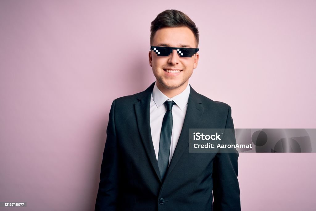 Young Handsome Caucasian Business Man Wearing Funny Thug Life Glasses With  A Happy And Cool Smile On Face Lucky Person Stock Photo - Download Image  Now - iStock