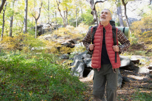 istock Man hiking outside in nature 1213748282