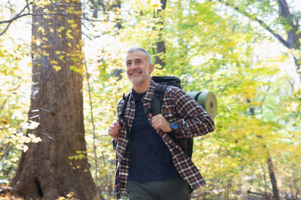 istock Man hiking outside in nature 1213748313