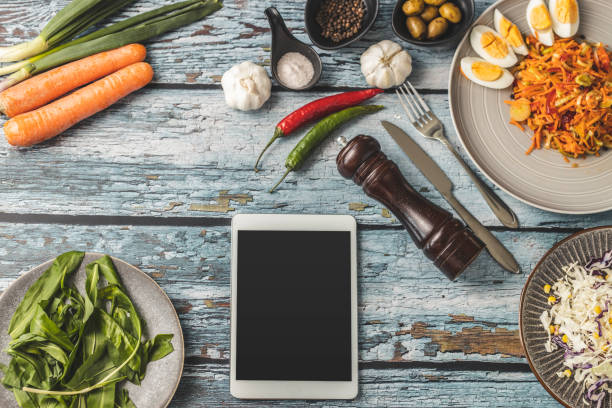 istock Digital tablet and vegan food 1213748420