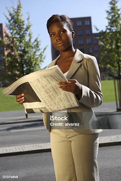 Thinking Professional Woman Stock Photo - Download Image Now - Adult, African Ethnicity, African-American Ethnicity