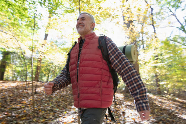 istock Man hiking outside in nature 1213748531