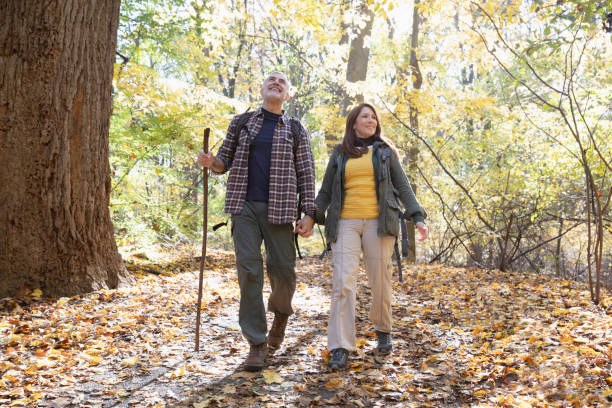 istock Couple hiking outside in nature 1213748567