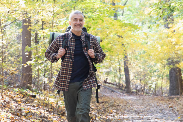 istock Man hiking outside in nature 1213748569