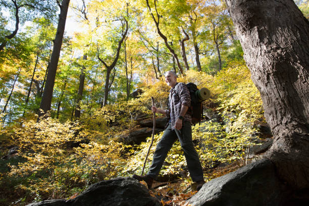 istock Man hiking outside in nature 1213749332