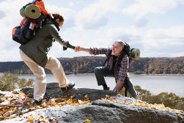 istock Couple hiking outside in nature 1213749407