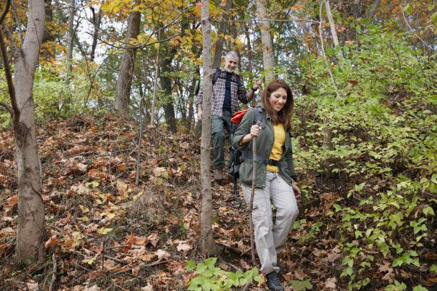 istock Couple hiking outside in nature 1213749902