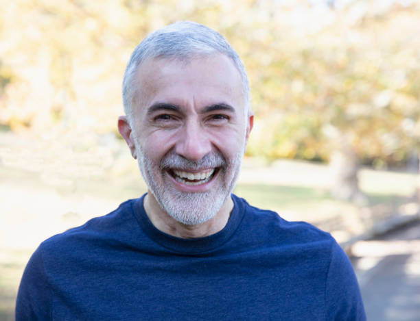 istock Portrait of man smiling looking at camera 1213750436