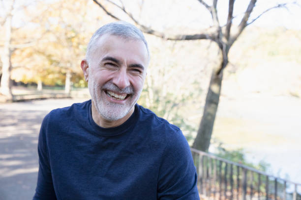 istock Portrait of man smiling looking at camera 1213750437