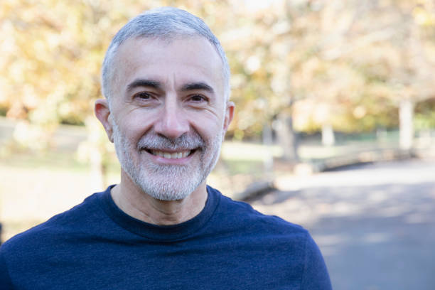 istock Portrait of man smiling looking at camera 1213750457