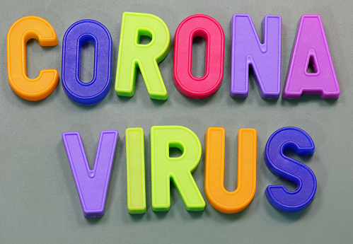 Magnetic letteres with text Corona Virus at school