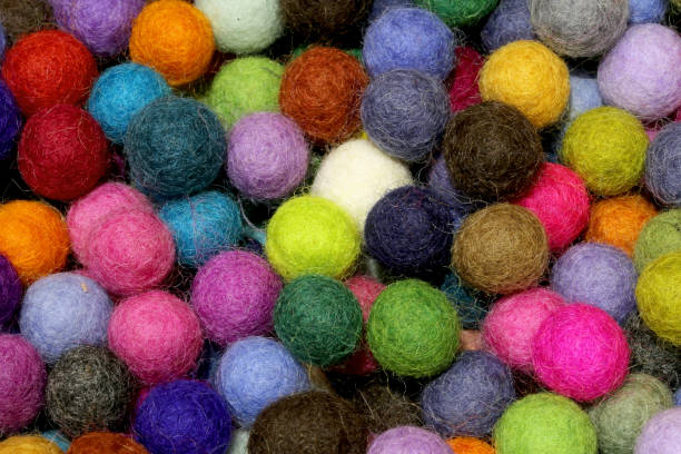 istock background of balls made of wool 1213751147